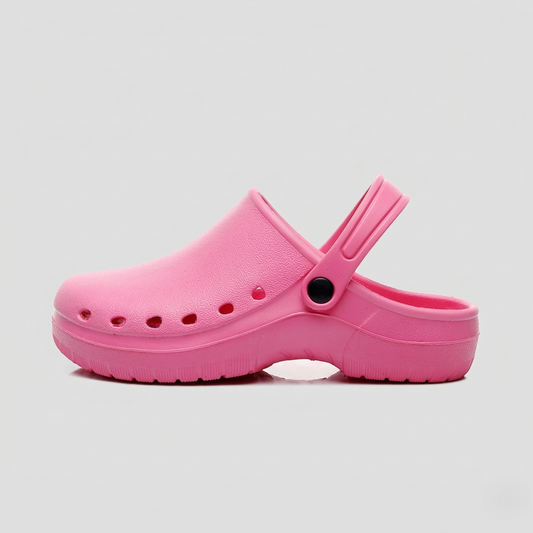 Pink nursing clog shoe on a light gray background